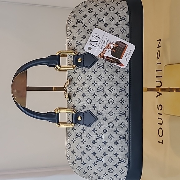 Louis Vuitton Handbags - LOUIS VUITTON VINTAGE '02 MONOGRAM MINI LIN ALMA LONG HANDBAG NO LONGER IN PROD!
